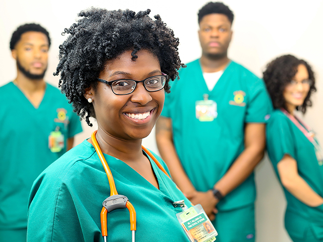 4 FAMU nursing students smiling at camera