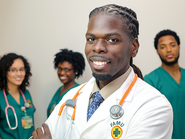 4 FAMU nursing students smiling at camera